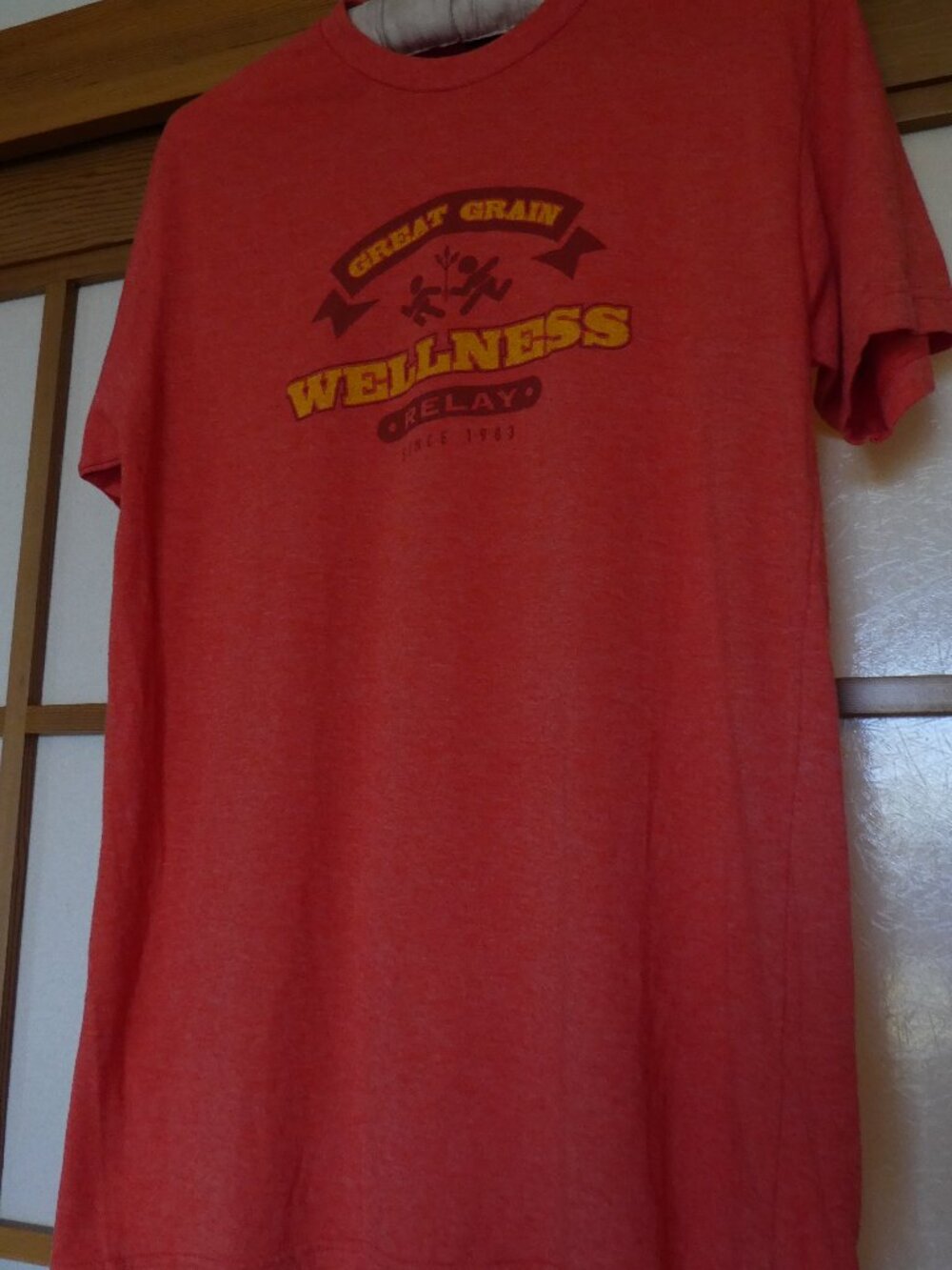 Great Grain Wellness Relay T-Shirt. Medium size. Light orange colour. 35% cotton